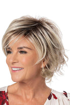 Model is wearing Easy Breezy wig by Toni Brattin in Platinum | Left Side
