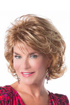 Model is wearing Perfection wig by Toni Brattin in Red Blonde | Front