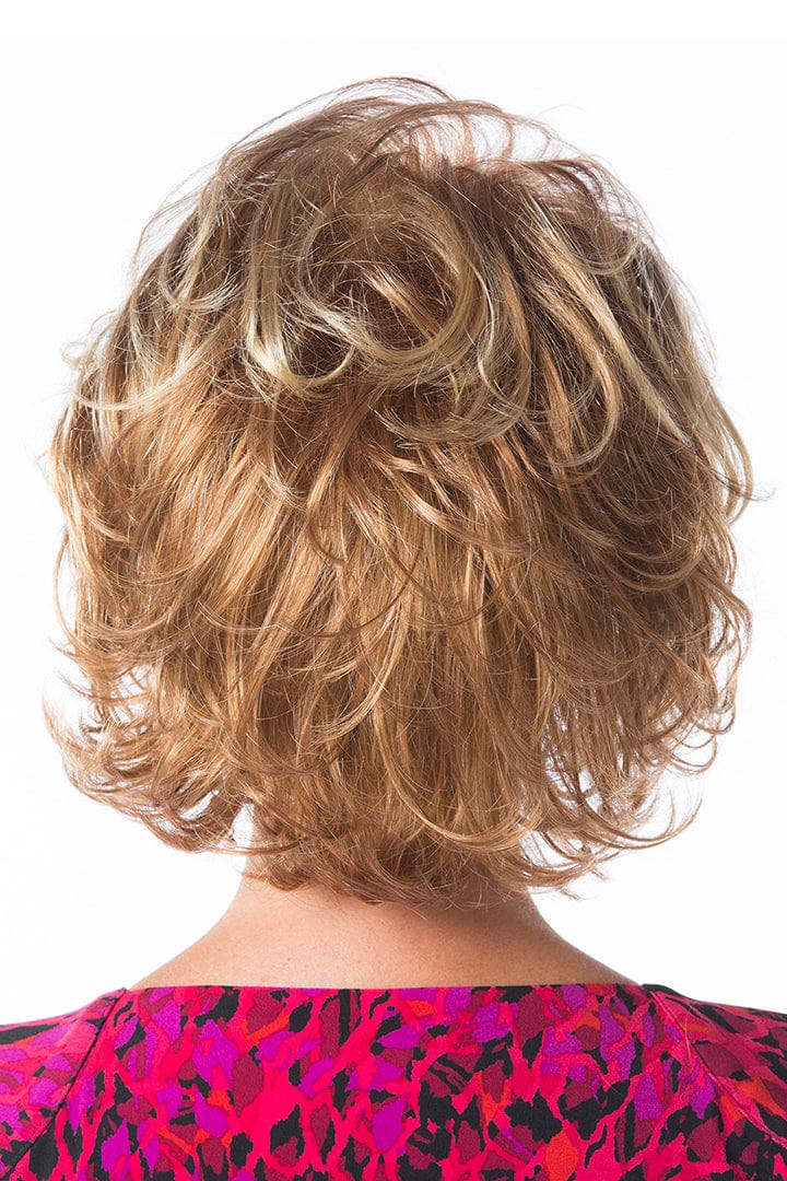 Model is wearing Perfection wig by Toni Brattin in Red Blonde | Back