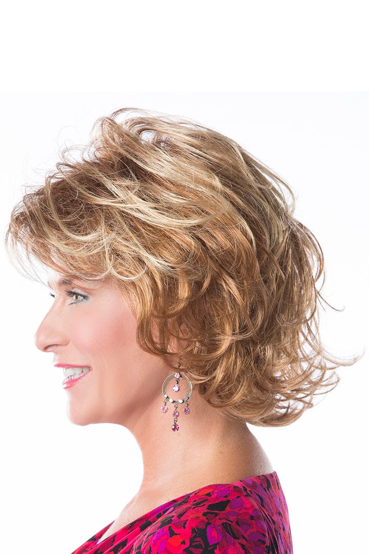 Model is wearing Perfection wig by Toni Brattin in Red Blonde | Left Side