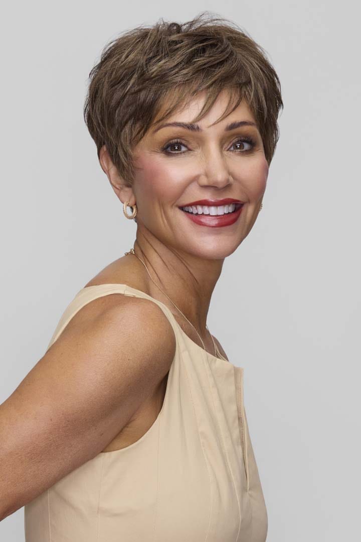 Woman wearing Tess wig by Jon Renau in 8RH14 | Front smiling