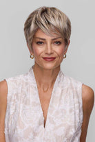 Woman wearing Tess wig by Jon Renau in FS17/101S18 | Front bangs styled down across forehead