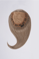 Lace hair topper with long, flowing hair