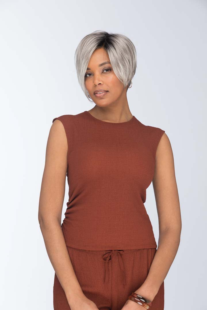 Vesper by Estetica short silver synthetic lace front wig with a sleek stacked back and side-swept layered fringe.