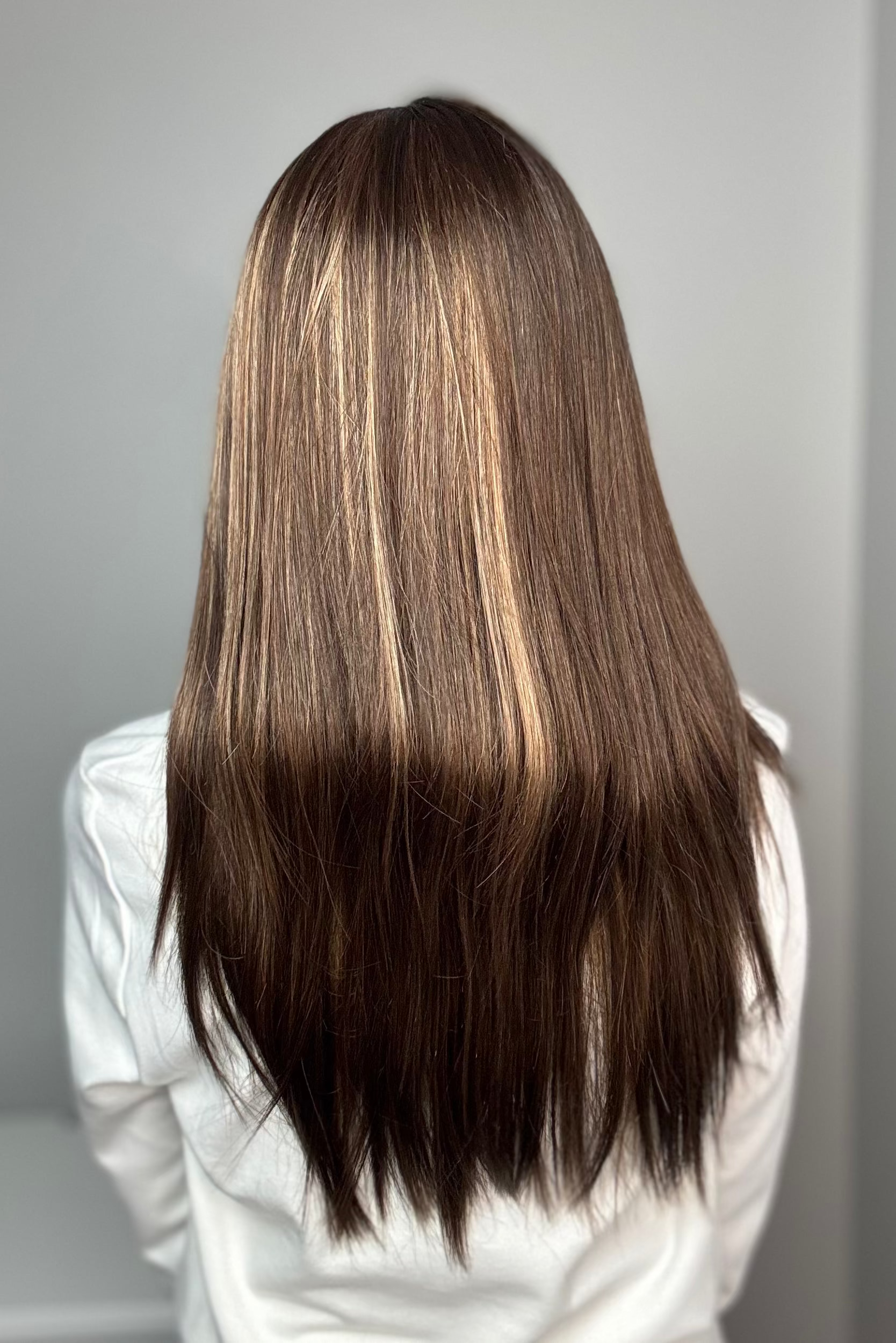 Woman with long brown wig (Violet by Henry Margu in 8/14H) back