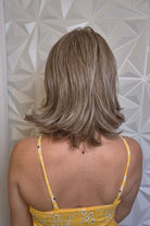 Woman wearing bronde lob wig (Harper by WigPro in 17/101)