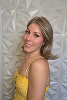 Woman wearing bronde lob wig (Harper by WigPro in 17/101)