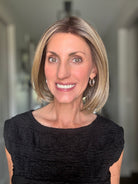 Woman wearing mid-length blonde bob (Bethany by Wig Pro in 12/R8)