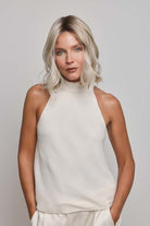 Yui by Noriko medium-length wavy blonde bob wig with a natural lace front and monofilament part.