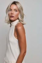 Yui by Noriko medium-length wavy blonde bob wig with a natural lace front and monofilament part.