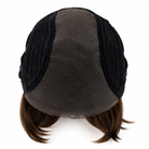 Back view of a short brown wig with a black mesh undercap, shown on a plain white background.