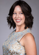 Woman wearing Zurich wig by Belle Tress in Triple Chocolate R | Side smiling