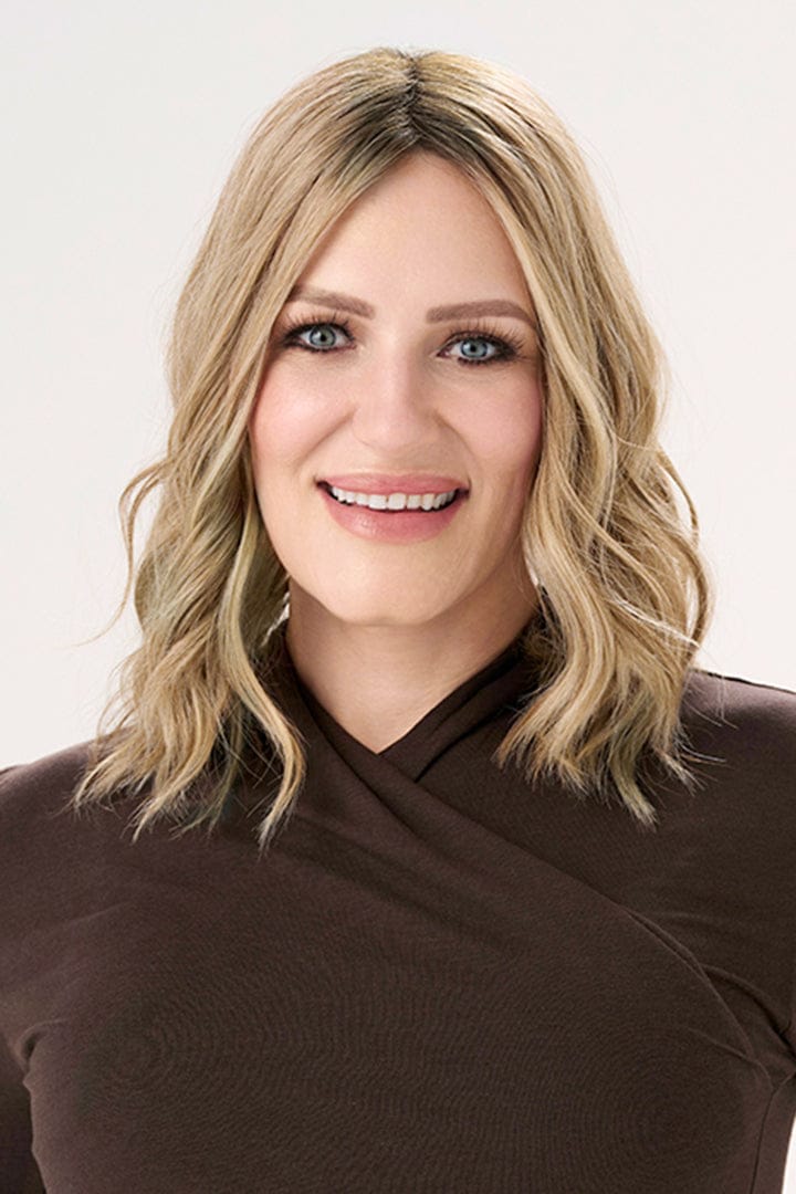 Amber wearing Barely There Wavy 12" Hair Topper by Envy in color Prosecco