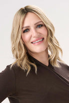 Amber wearing Barely There Wavy 12" Hair Topper by Envy in color Prosecco