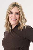 Amber wearing Barely There Wavy 12" Hair Topper by Envy in color Prosecco