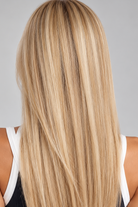 Doré | A luxurious blend of medium natural-ash blonde and light natural blonde with a medium ash brown root, creating a multi-dimensional hair color with a mix of lighter brown and blonde tones.