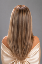 Woman wearing Bespoke Human Hair wig by PUSH - Back View in color Jolie | A base of rich brown, complemented by highlights of light brown and chunky medium natural-ash blonde highlights. 