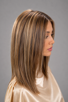 Woman wearing Bespoke Human Hair wig by PUSH - Side View in color Jolie | A base of rich brown, complemented by highlights of light brown and chunky medium natural-ash blonde highlights. 