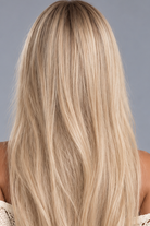 Glacial | A cool-toned light ash blonde color with light brown rooting, boasting sophistication and confidence.
