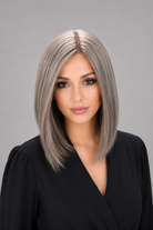 Woman wearing Bespoke human hair wig by PUSH - 16" inverted bob wig in color sage with a black blouse against a light grey background - Front view