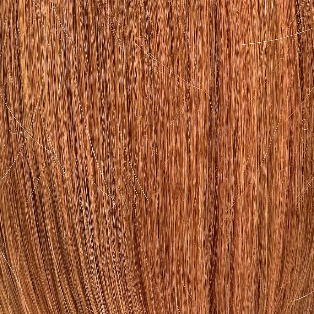 Close-up of a long, straight, reddish-brown synthetic wig with subtle highlights.