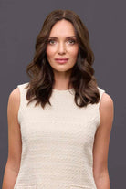 Model wearing 14-inch brown Remy human hair topper with a natural center part and soft, wavy texture.