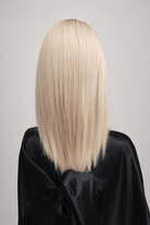 Glacial | A cool-toned light ash blonde color with light brown rooting, boasting sophistication and confidence.