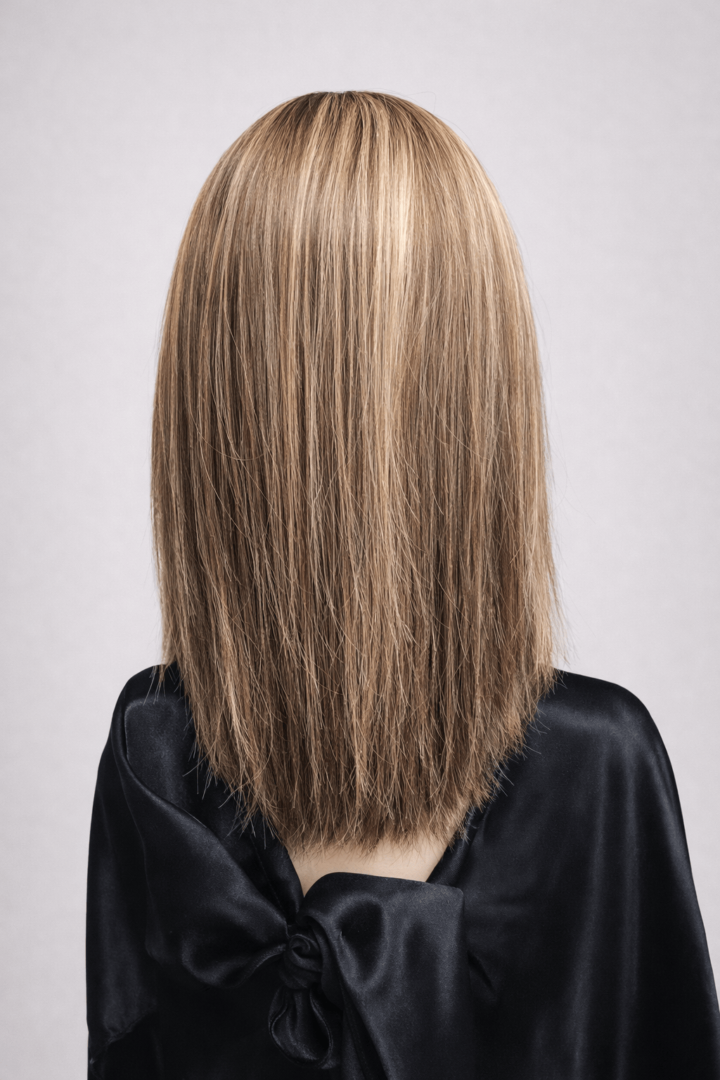 Belle | A base of rich brown, complemented by highlights in both light brown and medium ash blonde, creating a multi-dimensional and natural-looking effect.