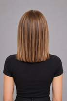 Belle | A base of rich brown, complemented by highlights in both light brown and medium ash blonde, creating a multi-dimensional and natural-looking effect, adding depth and warmth to the overall color.