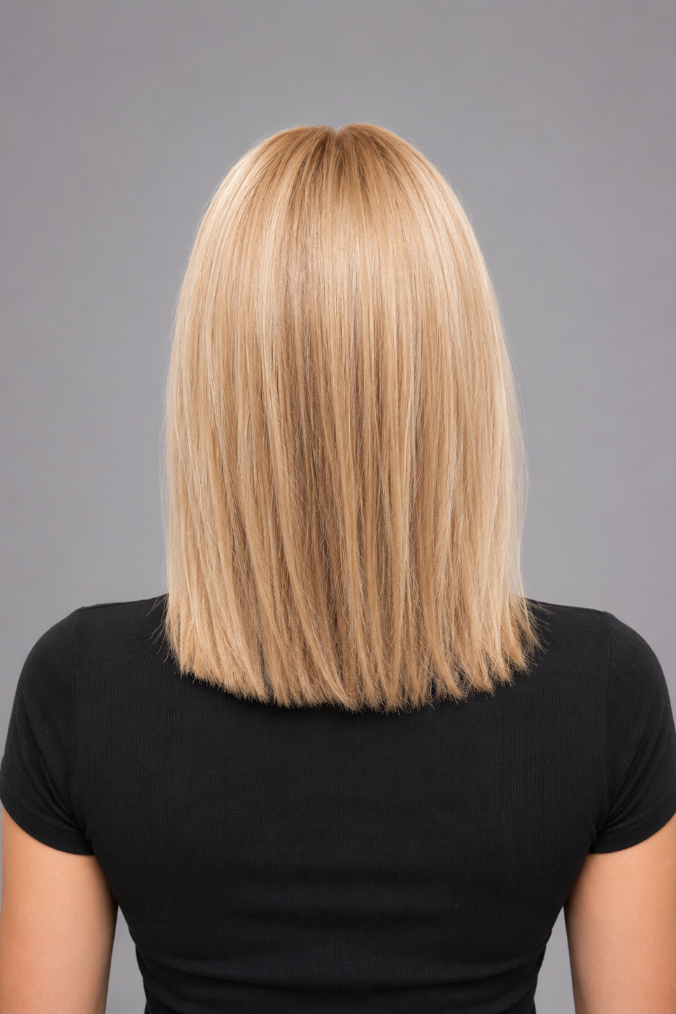 Doré | A luxurious blend of medium natural-ash blonde and light natural blonde with a medium ash brown root, creating a multi-dimensional hair color with a mix of lighter brown and blonde tones.