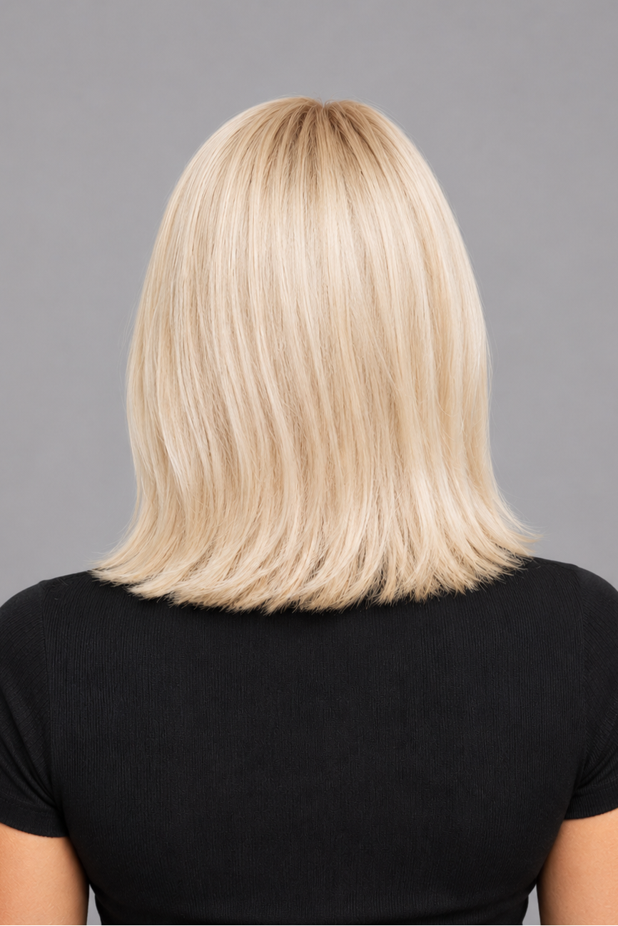 Glacial | A cool-toned light ash blonde color with light brown rooting, boasting sophistication and confidence.