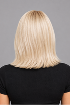 Glacial | A cool-toned light ash blonde color with light brown rooting, boasting sophistication and confidence.
