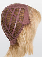 Interior view of Elle Mono wig cap showing monofilament top, lace front, and wefted back with blonde wavy hair.
