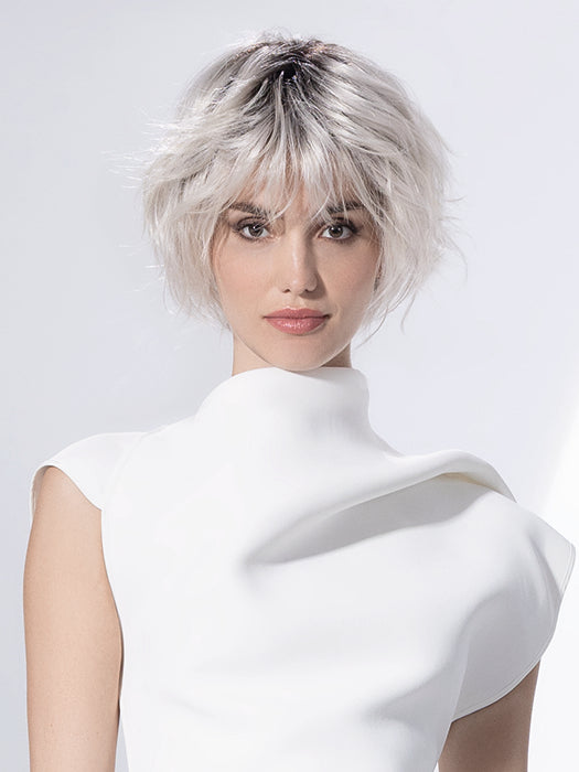 Woman wearing Escape Soft wig by Ellen Wille in Silver Blonde Rooted | Front