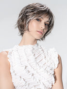 Woman wearing Escape Soft wig by Ellen Wille in Smoke Frosted | Side