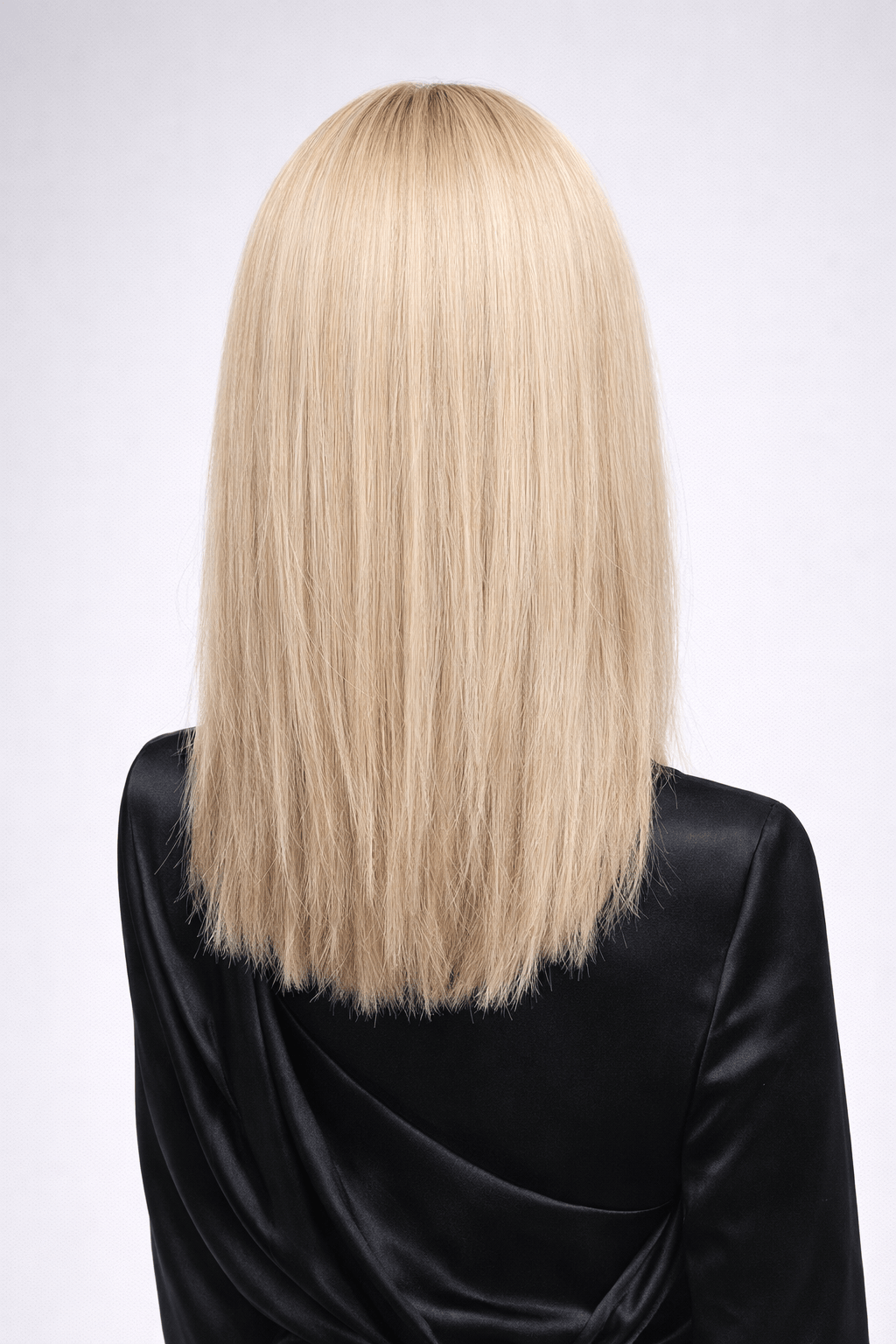 Brûlée | Natural ash blonde with highlights of golden blonde with a medium to dark ash brown root, creating a multi-dimensional and natural color that blends cool and warm tones.