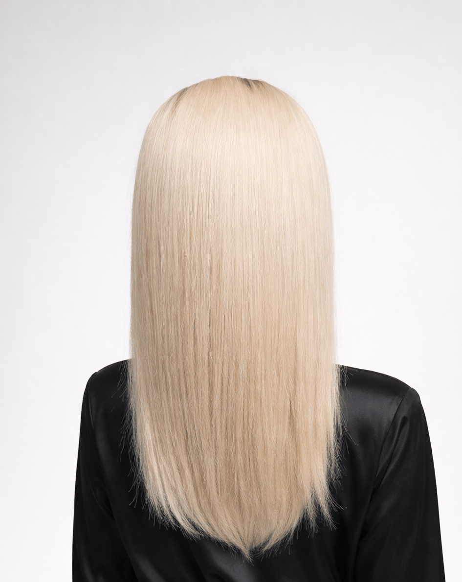 Glacial | A cool-toned light ash blonde color with light brown rooting, boasting sophistication and confidence.