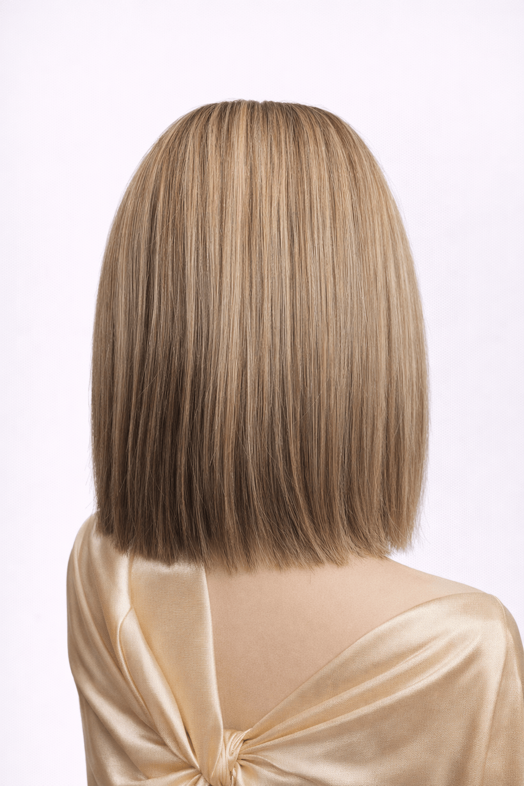 Belle Crème | A balanced blend of cool cocoa and beige-brown tones with subtle, creamy highlights throughout for natural depth and movement.