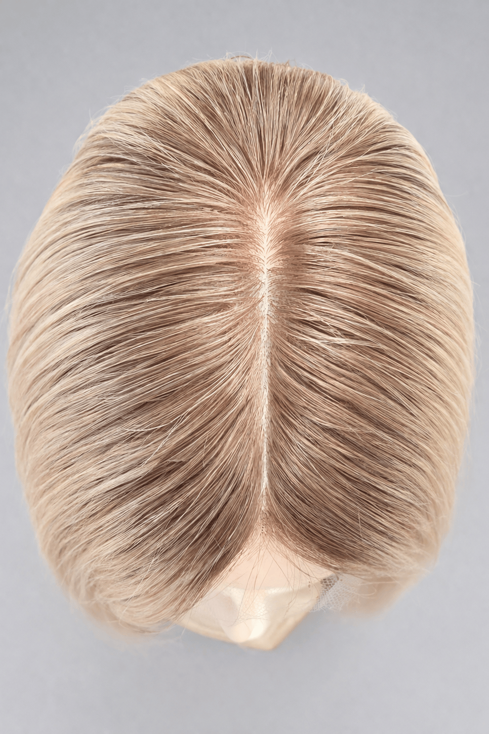 Mannequin wearing Genevieve human hair wig by push in color Fleur Blonde - Top view.