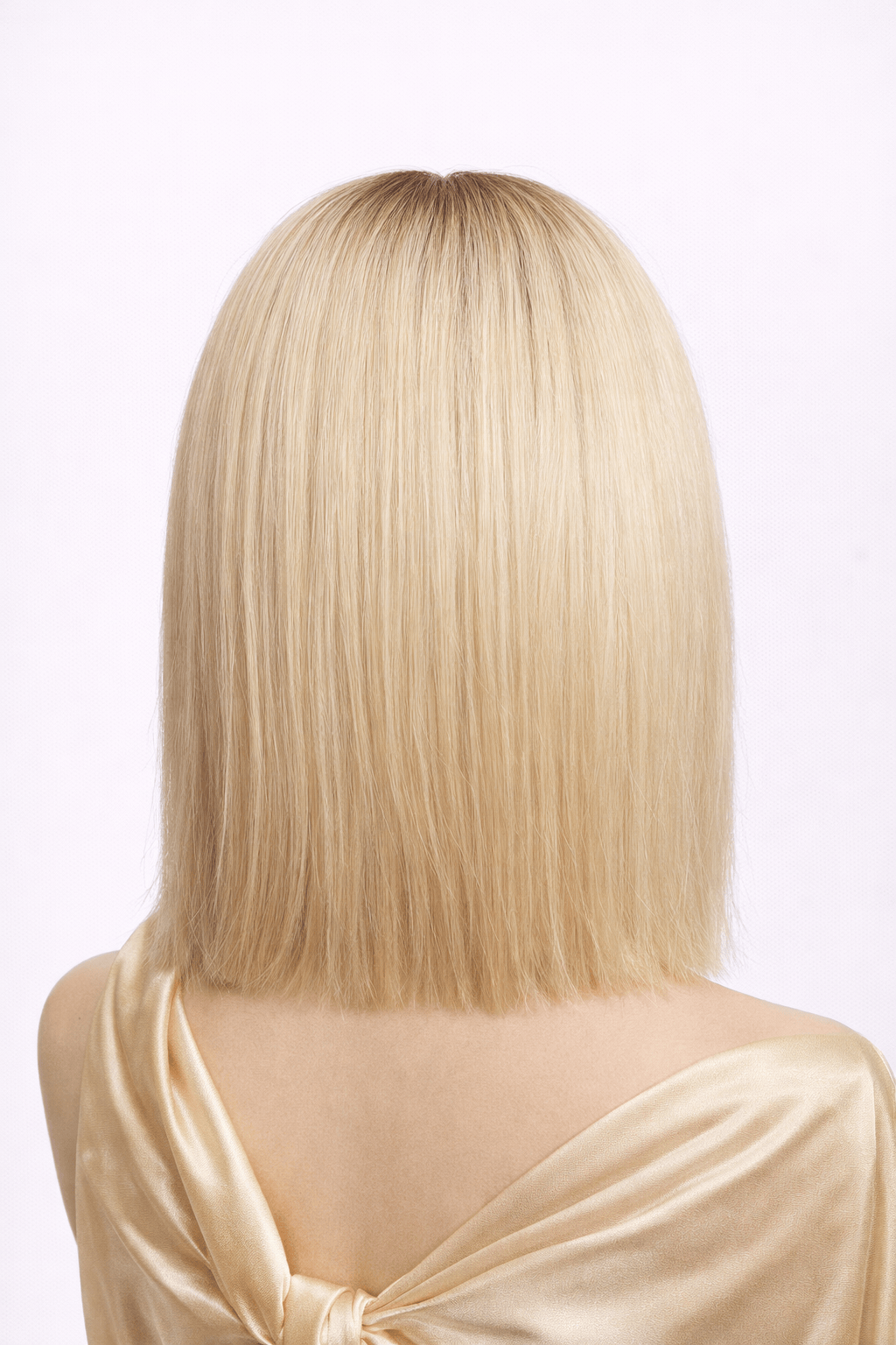 Fleur Blonde | This shade features light buttery blonde hues delicately layered with cooler beige and champagne notes, with soft blended rooting.