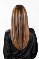 Jolie | A base of rich brown, complemented by highlights of light brown and chunky medium natural-ash blonde highlights.