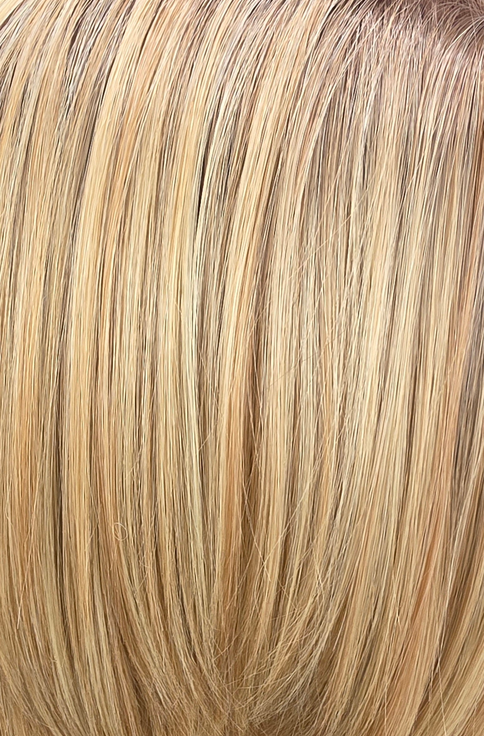 Golden Linen Rooted | A softly rooted medium ash-beige base that transitions into a luminous blend of warm beige blonde, creamy vanilla, and honey highlights. Delicate sandy lowlights create natural depth and dimension