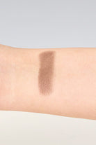 Swatch of Love Match Powder Stick by Envy Color 8 on wrist