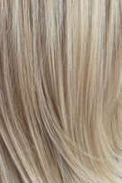 Pearl Silk Rooted | A luminous cool light blonde featuring a light beige base with creamy vanilla, champagne, and soft ivory highlights, delicately blended with light ash lowlights