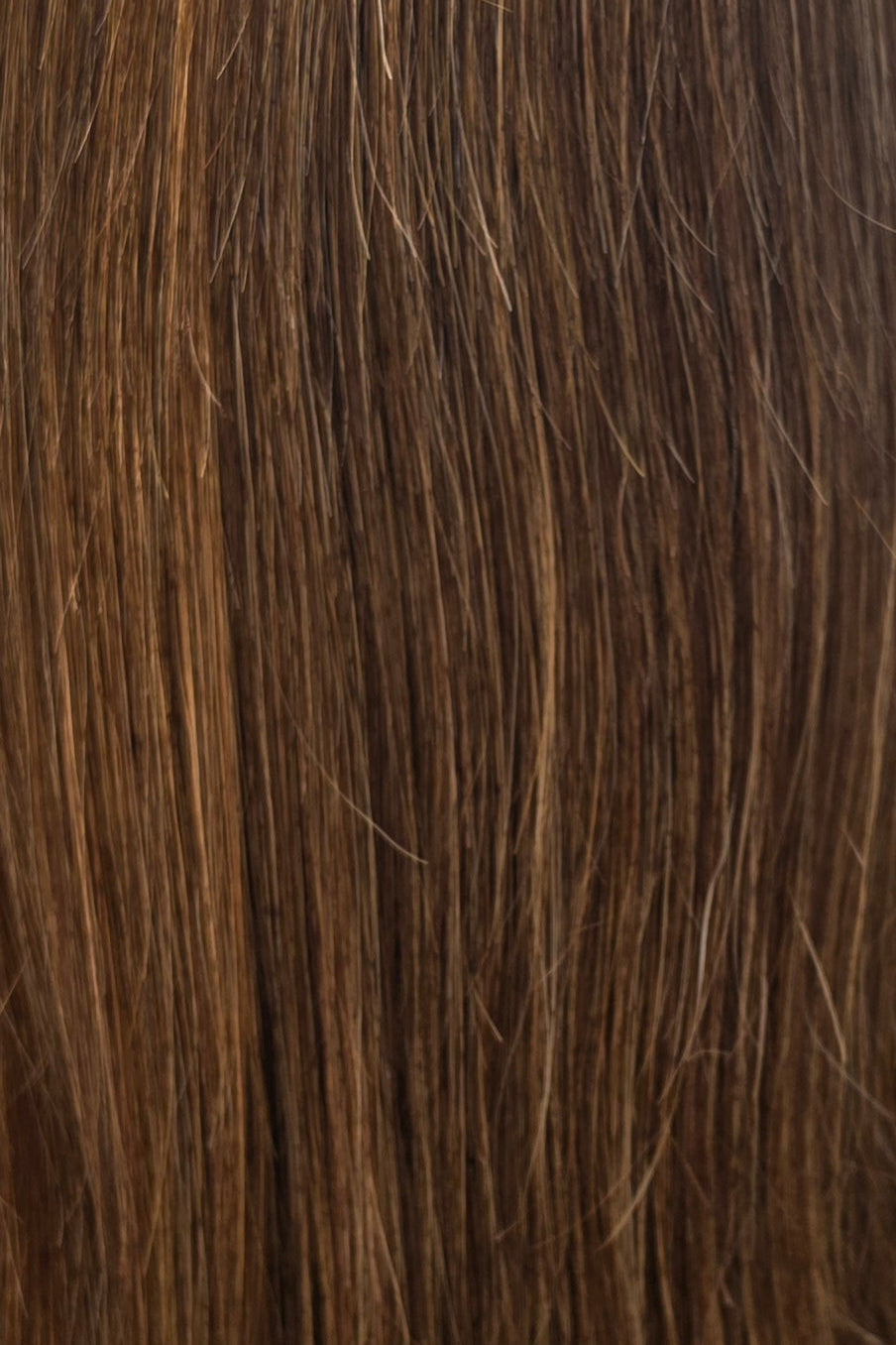 Mocha Blend | S830.6.30 | A rich, dimensional brunette featuring a dark mocha brown base blended with warm chestnut and caramel-brown tones, accented by fine golden-copper highlights throughout.