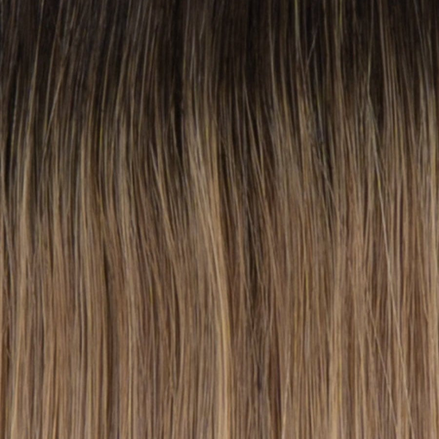 RH10/20SS | Shaded Buttered Walnut | A rooted medium brown / brunette shade built around buttered walnut. The darker root gives the color extra depth while the lengths show the lighter blended tones.
