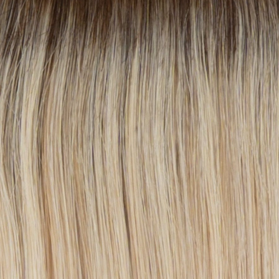 RH14/88SS | Shaded Golden Wheat | A rooted light blonde / light brown shade built around golden wheat. The darker root gives the color extra depth while the lengths show the lighter blended tones.