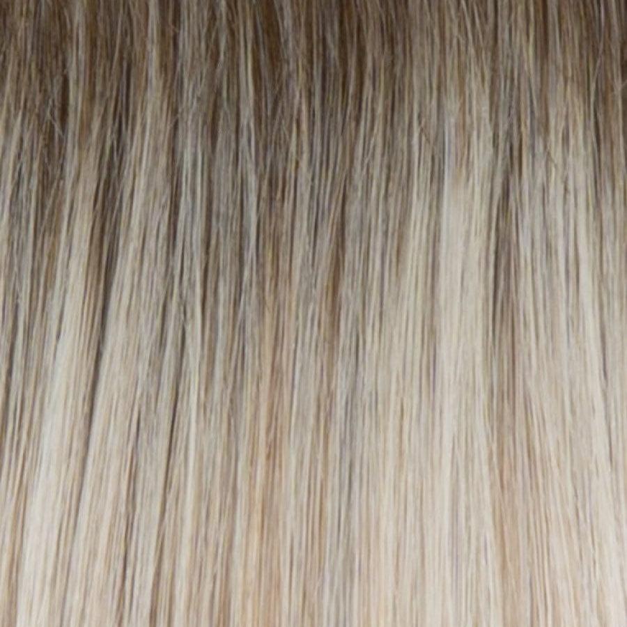 RH18/23SS | Shaded Glazed Biscuit | A light blonde / light brown shade with salon-style multi-tonal highlights and lowlights; shaded biscuit is the dominant color impression. A darker root adds depth and a natural grow-out effect.