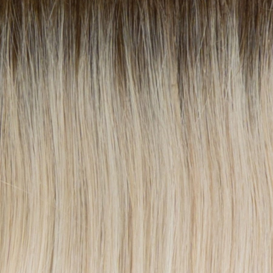 RH612SS | Shaded Champagne | A rooted medium brown / brunette shade built around champagne. The darker root gives the color extra depth while the lengths show the lighter blended tones.