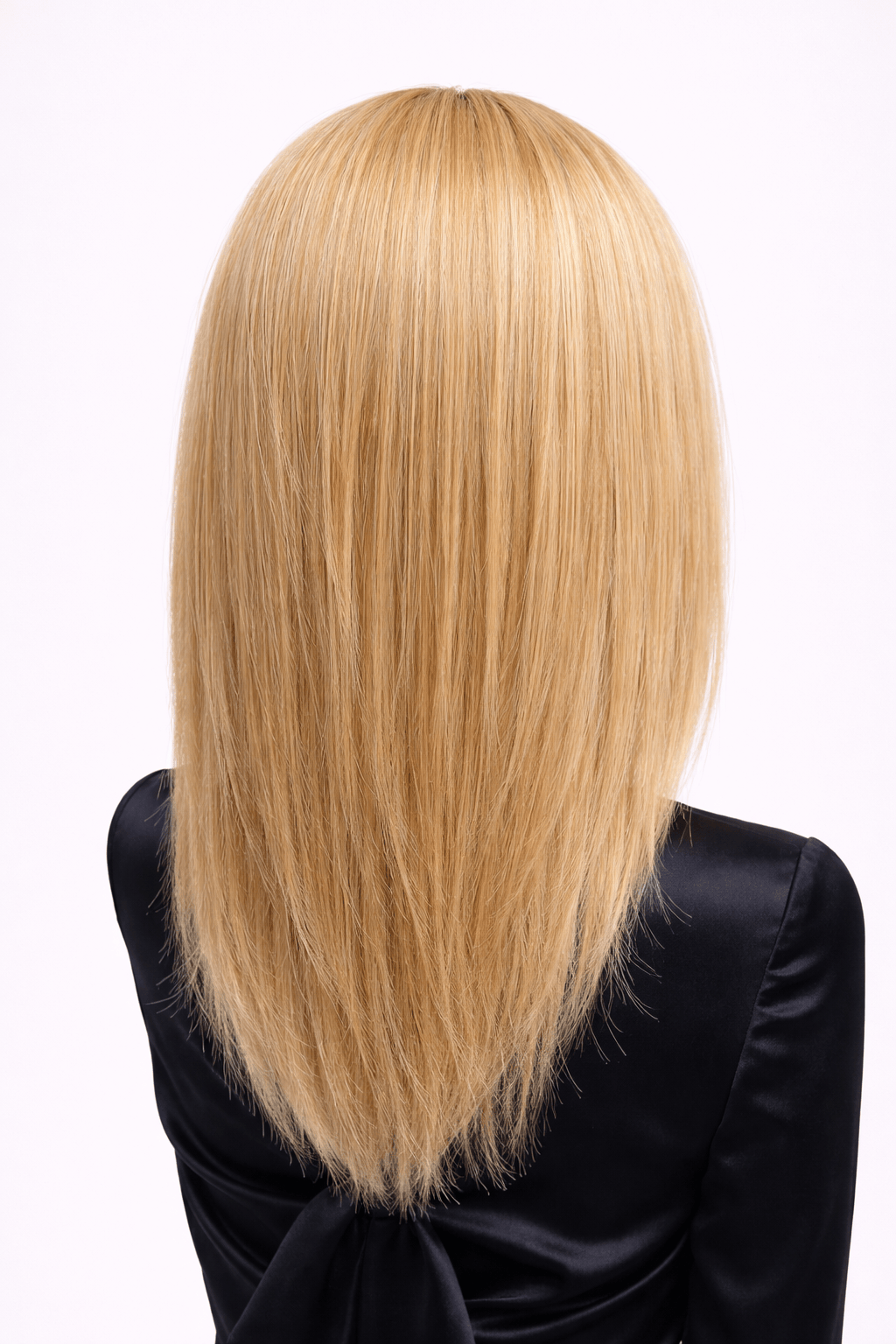Doré | A luxurious blend of medium natural-ash blonde and light natural blonde with a medium ash brown root, creating a multi-dimensional hair color with a mix of lighter brown and blonde tones.